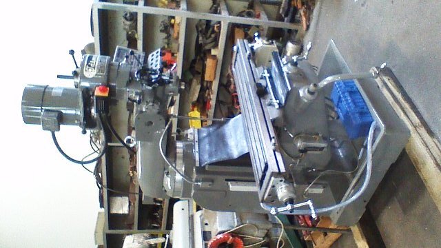 Turret milling machine New(bridgeport) Tasmac X6323A single phase NT30 3 axis DRO, 1 axis power feed, Table 1250x230mm